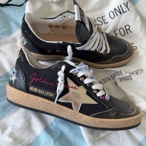 Golden Goose Black and Gold Star Sneakers